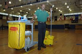 man with cleaning materials